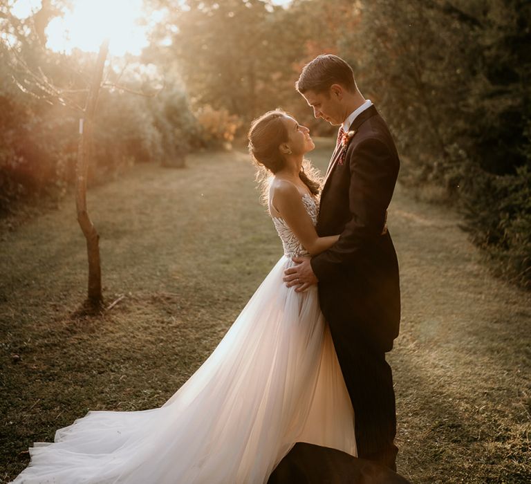 Golden hour wedding portrait by Elena Popa Photography at Evenley Wood Garden