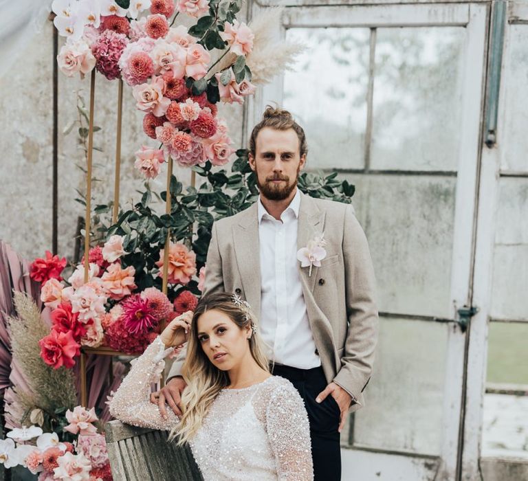 Bride and groom portrait at Dream Capture Workshop with pink colour scheme