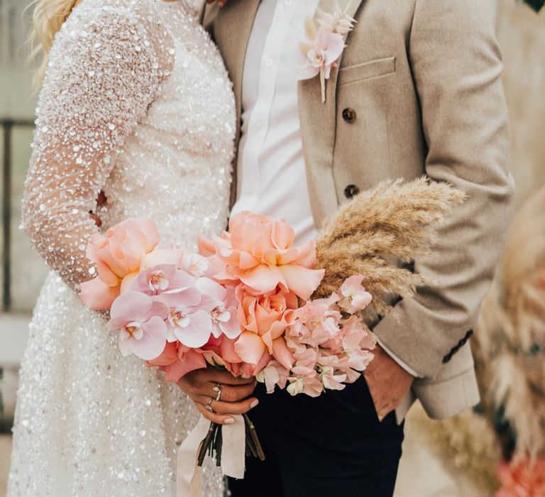 Blush pink and peach tropical wedding bouquet