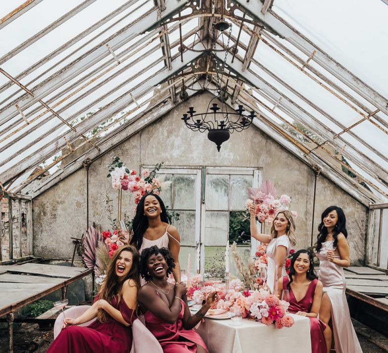 Intimate bridal party portrait in a conservatory