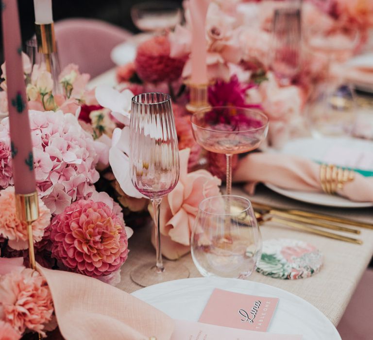 Table setting decor for wedding with pink colour scheme