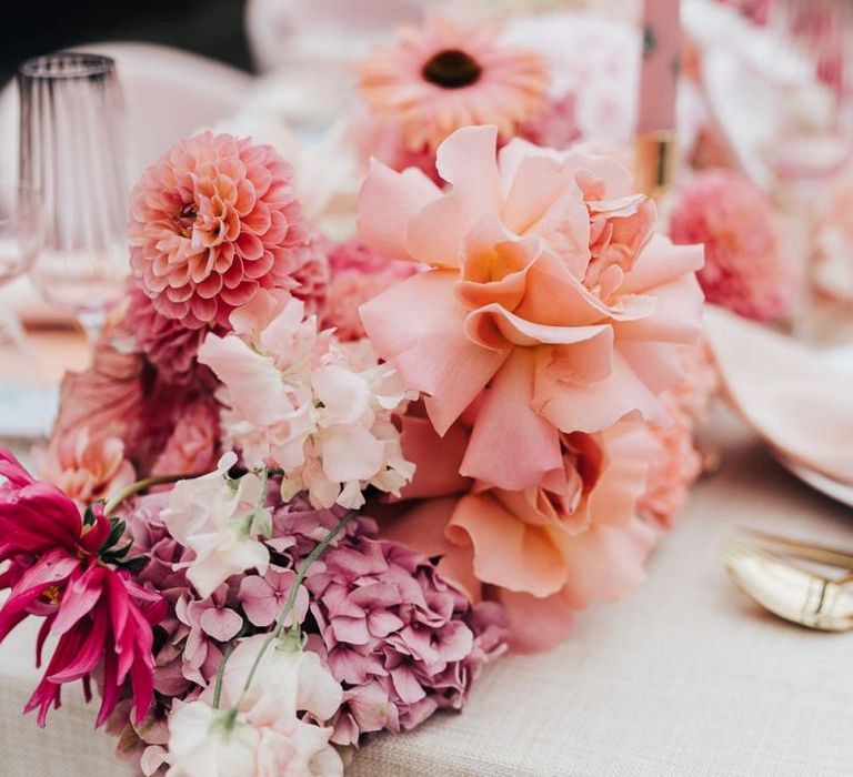 Romantic blush pink and peach wedding flower centrepiece for intimate wedding with pink colour scheme