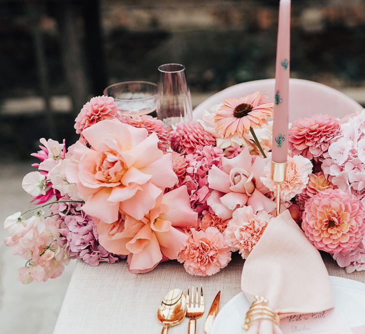 Wedding reception table flowers with dahlias, roses, hydrangeas and carnations