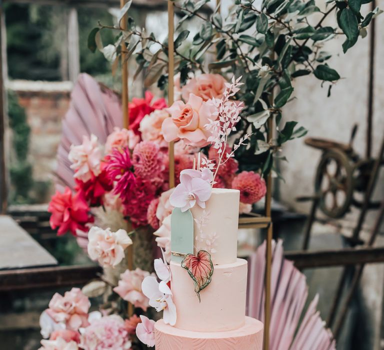 Stylish wedding cake by Sugarplum Bakes for intimate wedding with pink colour scheme