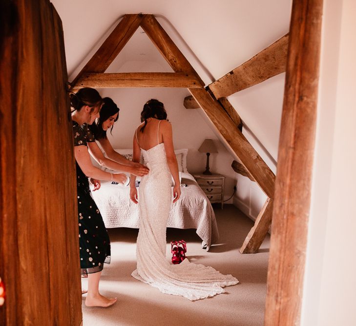 Bride Gets In To Beautiful Wedding Dress