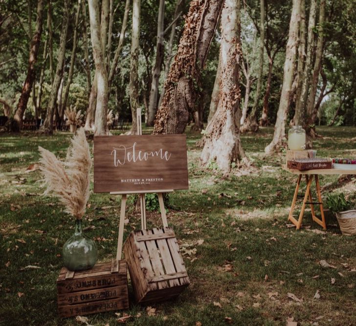 Wooden Welcome Sign &amp; Drinks Station Wedding Decor | Woodland Wedding at Sa Farinera de Sant LLuis Wedding Venue, Catalan Empordà, Spain | Planned &amp; Styled by Mille Papillons | HUMà06 Photography | HUMà06 Photography