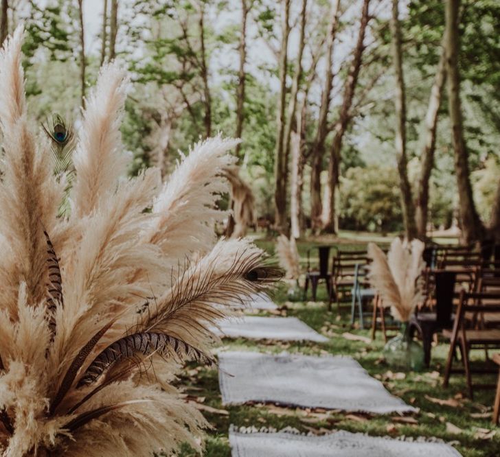 Pampas Grass Moongate &amp; Aisle Floral Arrangements | Outdoor Woodland Wedding at Sa Farinera de Sant LLuis Wedding Venue, Catalan Empordà, Spain | Planned &amp; Styled by Mille Papillons | HUMà06 Photography | HUMà06 Photography