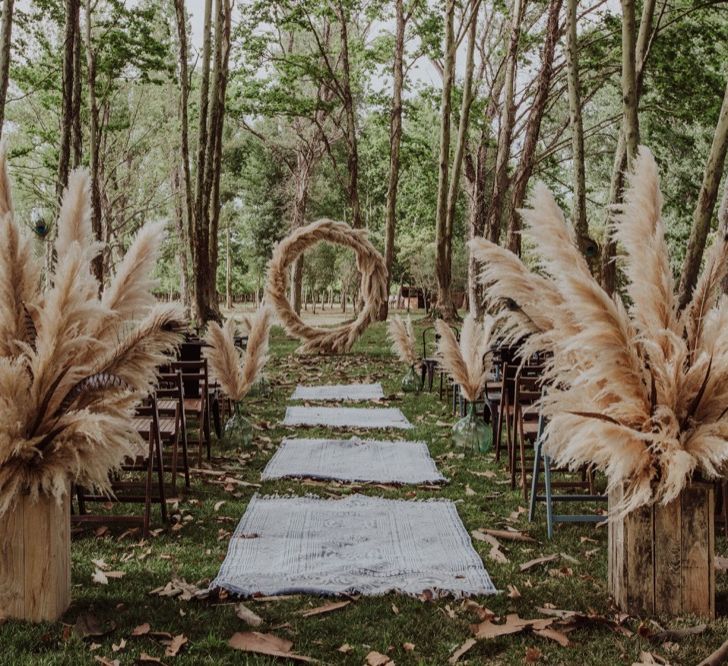 Pampas Grass Moongate &amp; Aisle Floral Arrangements | Outdoor Woodland Wedding at Sa Farinera de Sant LLuis Wedding Venue, Catalan Empordà, Spain | Planned &amp; Styled by Mille Papillons | HUMà06 Photography | HUMà06 Photography