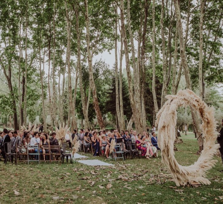 Pampas Grass Moongate &amp; Aisle Floral Arrangements | Outdoor Woodland Wedding at Sa Farinera de Sant LLuis Wedding Venue, Catalan Empordà, Spain | Planned &amp; Styled by Mille Papillons | HUMà06 Photography | HUMà06 Photography