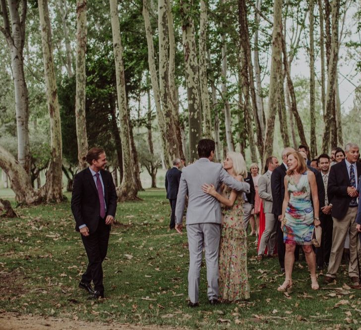 Wedding Guest Hugs | Outdoor Woodland Wedding at Sa Farinera de Sant LLuis Wedding Venue, Catalan Empordà, Spain | Planned &amp; Styled by Mille Papillons | HUMà06 Photography | HUMà06 Photography