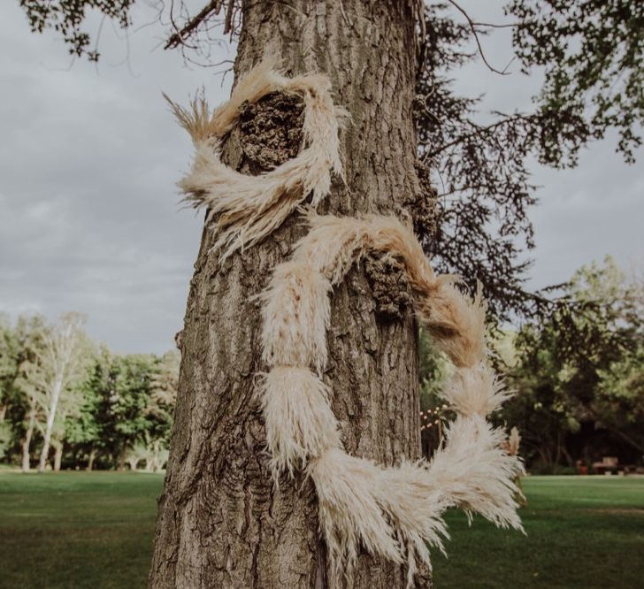 Pampas Grass Hoops Wedding Decor | Outdoor Woodland Wedding at Sa Farinera de Sant LLuis Wedding Venue, Catalan Empordà, Spain | Planned &amp; Styled by Mille Papillons | HUMà06 Photography | HUMà06 Photography