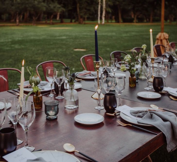 Tapper Candles, Grey Napkins, Black Glasses Table Decor | Outdoor Woodland Wedding at Sa Farinera de Sant LLuis Wedding Venue, Catalan Empordà, Spain | Planned &amp; Styled by Mille Papillons | HUMà06 Photography | HUMà06 Photography