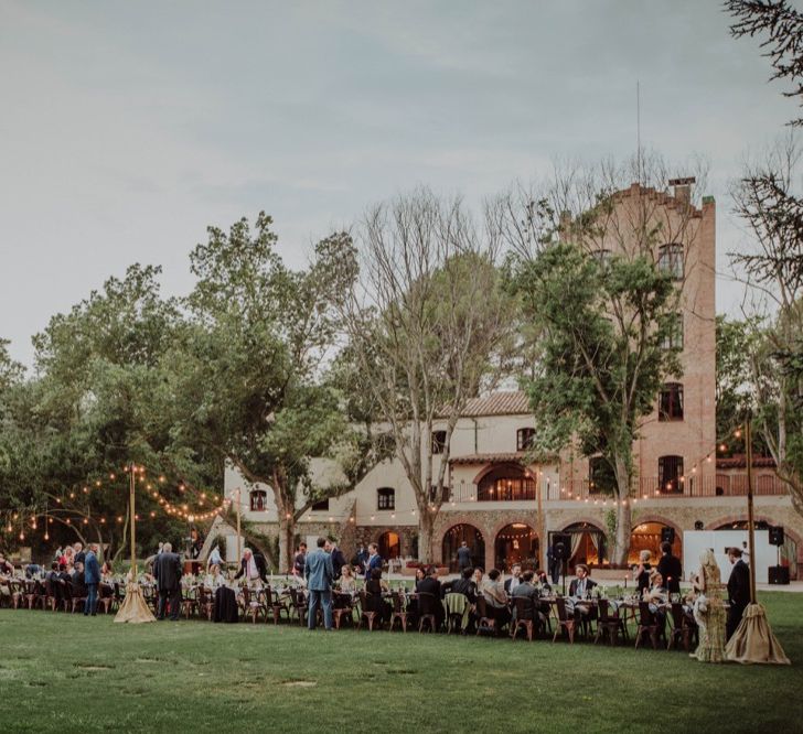 Outdoor Wedding Reception with Festoon Lights | Woodland Wedding Ceremony at Sa Farinera de Sant LLuis Wedding Venue, Catalan Empordà, Spain | Planned &amp; Styled by Mille Papillons | HUMà06 Photography | HUMà06 Photography