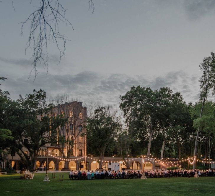 Outdoor Wedding Reception with Festoon Lights | Woodland Wedding Ceremony at Sa Farinera de Sant LLuis Wedding Venue, Catalan Empordà, Spain | Planned &amp; Styled by Mille Papillons | HUMà06 Photography | HUMà06 Photography