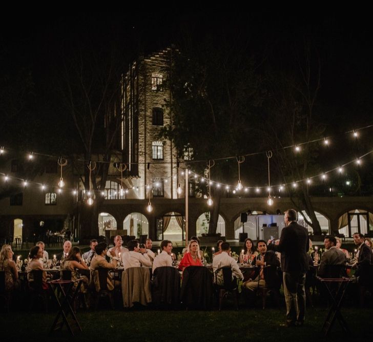 Outdoor Wedding Reception with Festoon Lights | Woodland Wedding Ceremony at Sa Farinera de Sant LLuis Wedding Venue, Catalan Empordà, Spain | Planned &amp; Styled by Mille Papillons | HUMà06 Photography | HUMà06 Photography