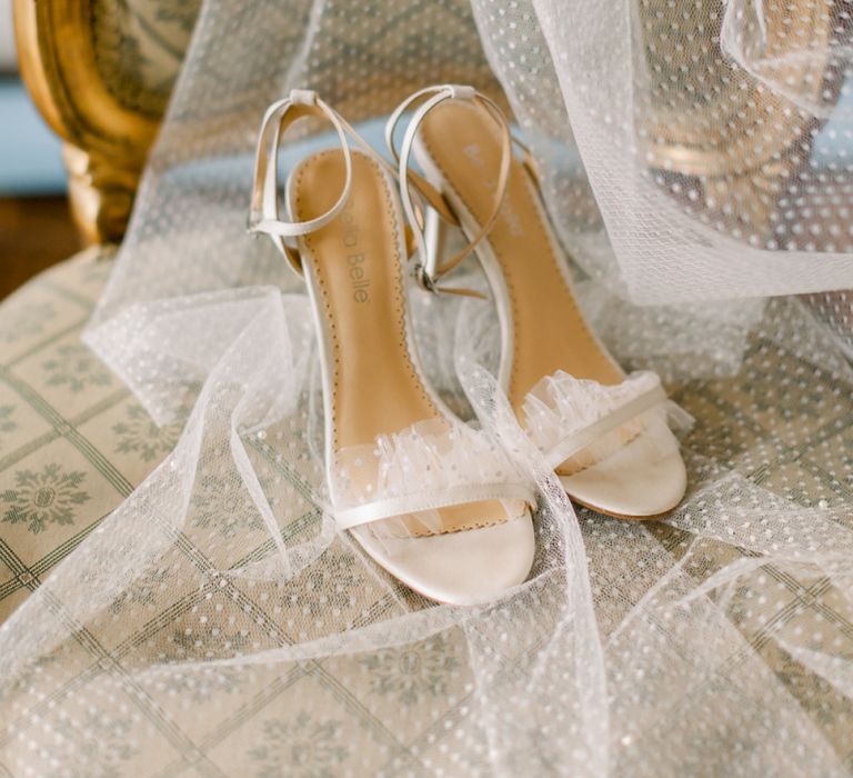 Polka dot wedding veil and strappy sandals