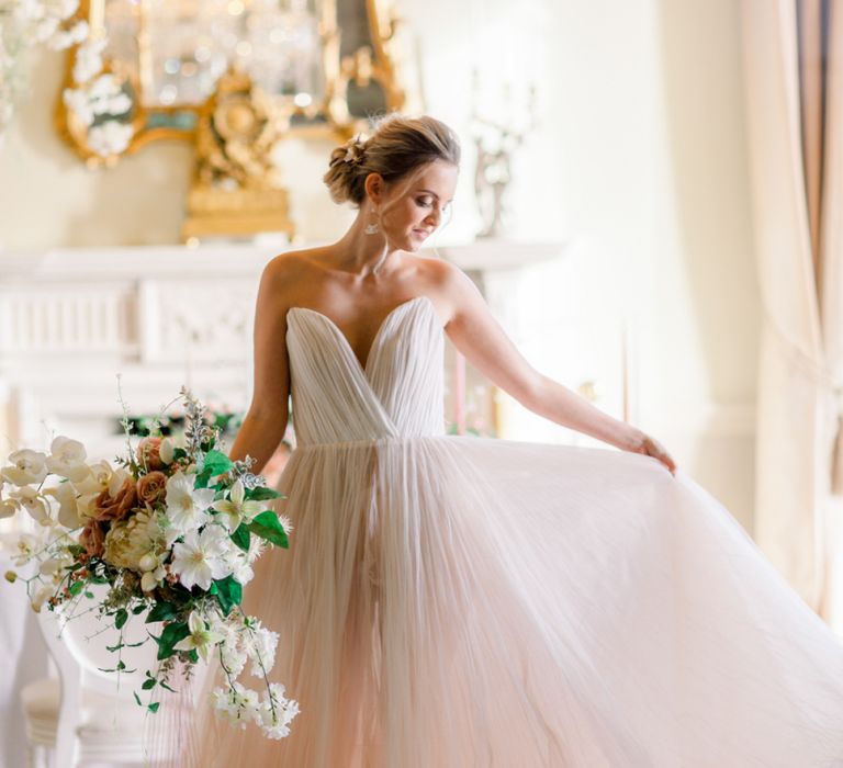 Blush pink off shoulder wedding dress