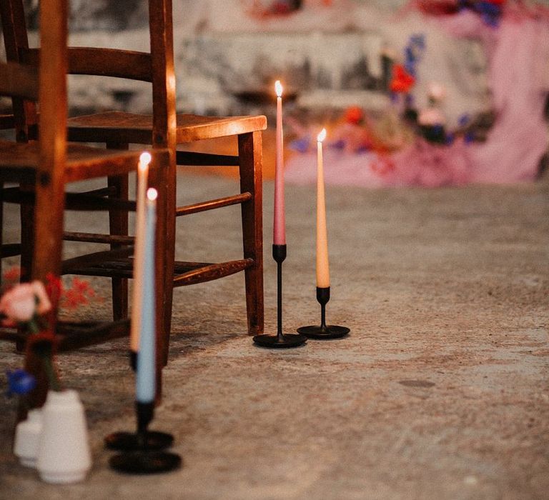 Aisle Seats Lined with Coloured Taper Candles