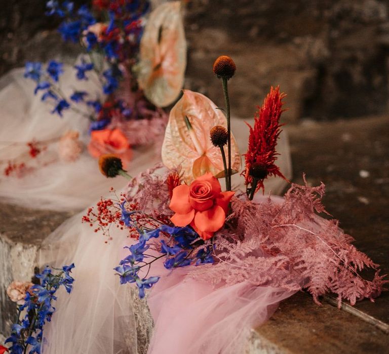 Pink chiffon drapes and Wedding Flowers with Anthurium and  Astilbe