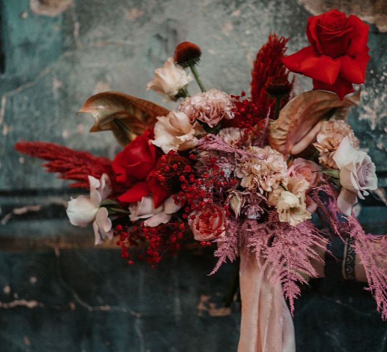 Pink and Red Wedding Bouquet Tied With Ribbon