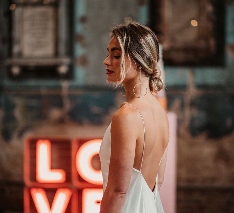 Bride in Slip Wedding Dress and Chic Updo