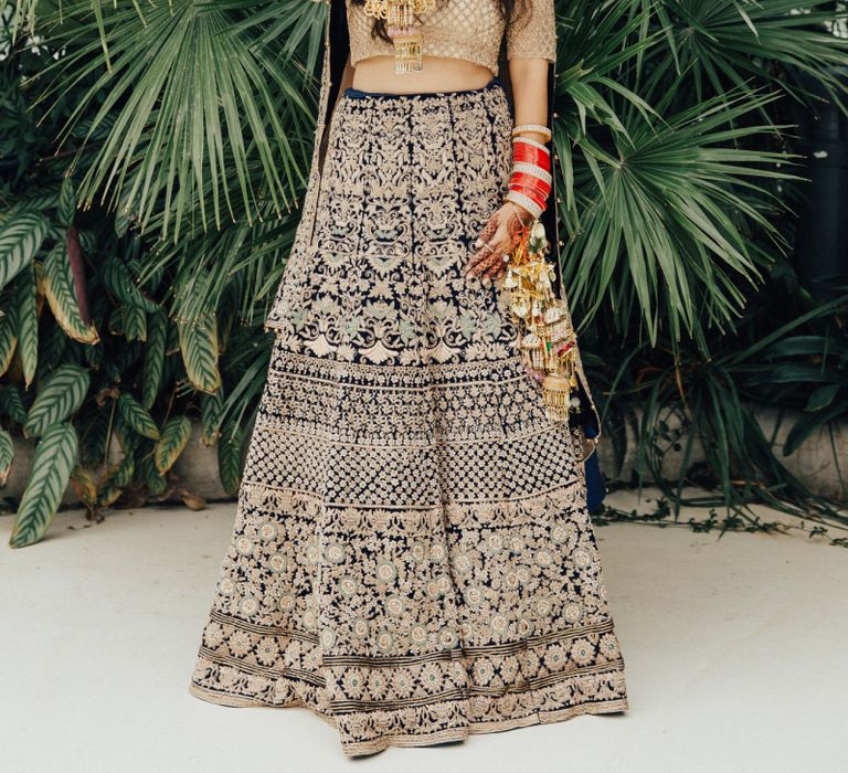 Indian Bride in Traditional Gold and Navy Saree