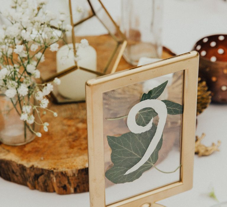 Gold Spray Painted Framed with Botanical Leaf Decor