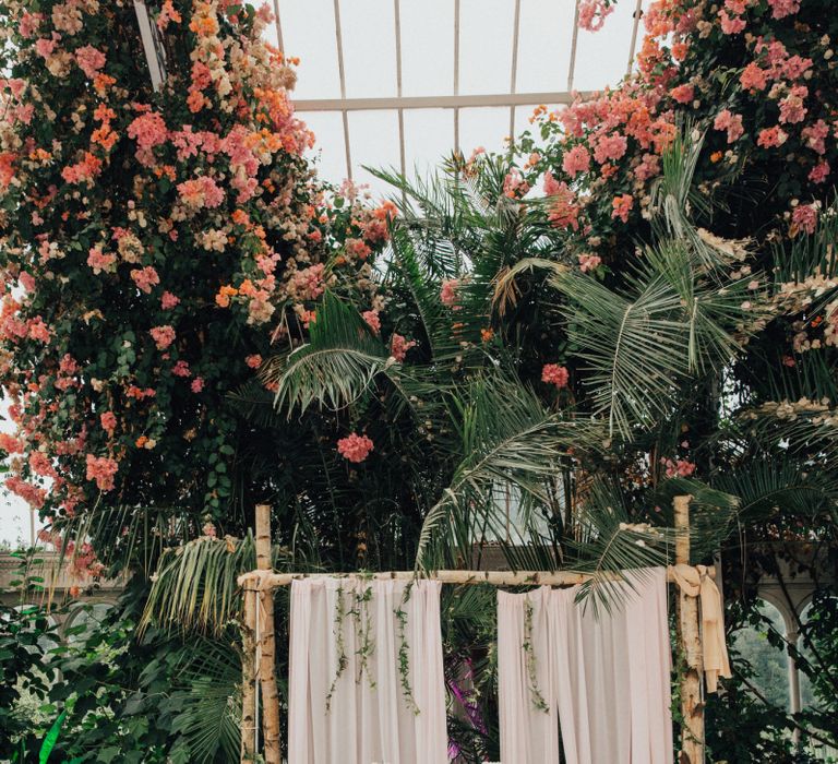 Botanical Top Table Wedding Decor With Bamboo Backdrop  and Wooden Crate  and Hurricane Lamps