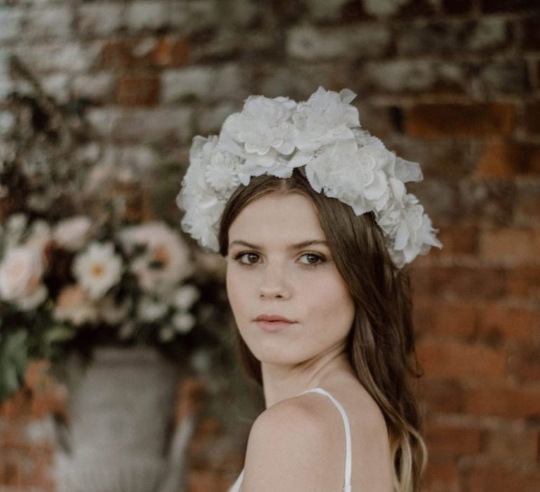 Beautiful Bride in Ruffle Headdress and Puffed Sleeve Wedding Dress