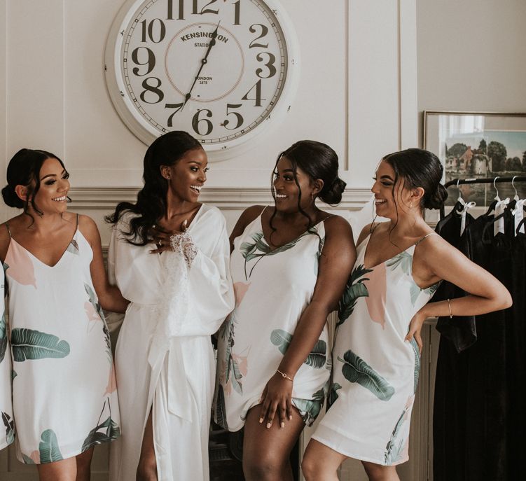 Wedding morning bridal party portrait in matching botanical slips