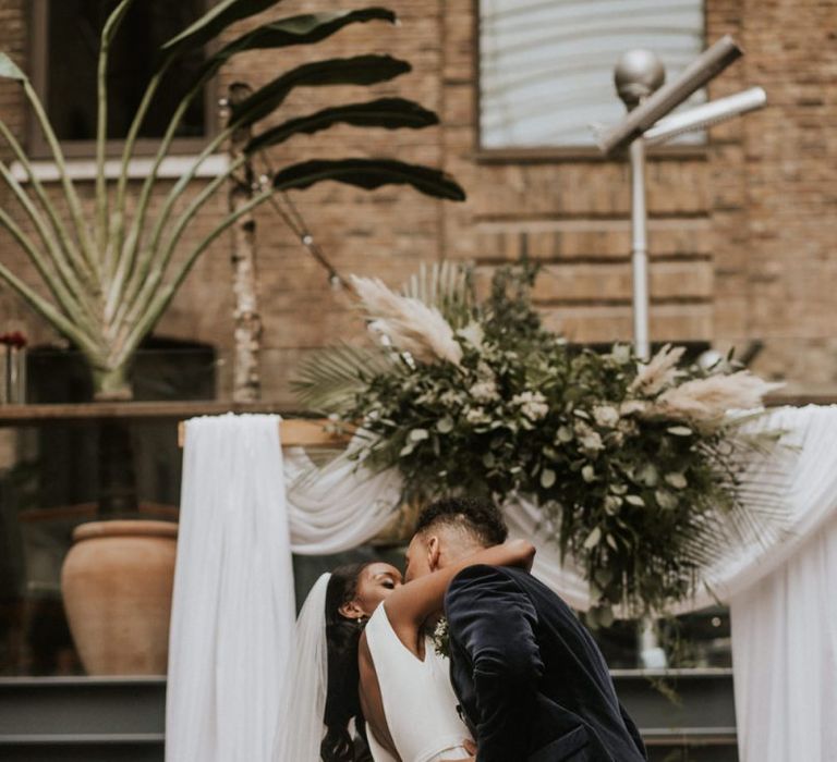 You may now kiss the bride wedding ceremony moment