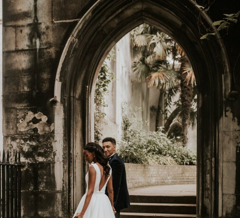 Black bride in Made With Love Bridal gown with detachable skirt