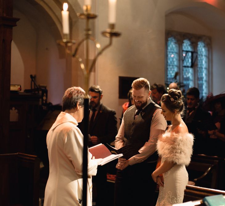 Christmas Pub Wedding At The Falcon Rotherwick With Bride In Alice By Watters And Candle Lit Wedding Ceremony Images By Rebecca Searle Photography