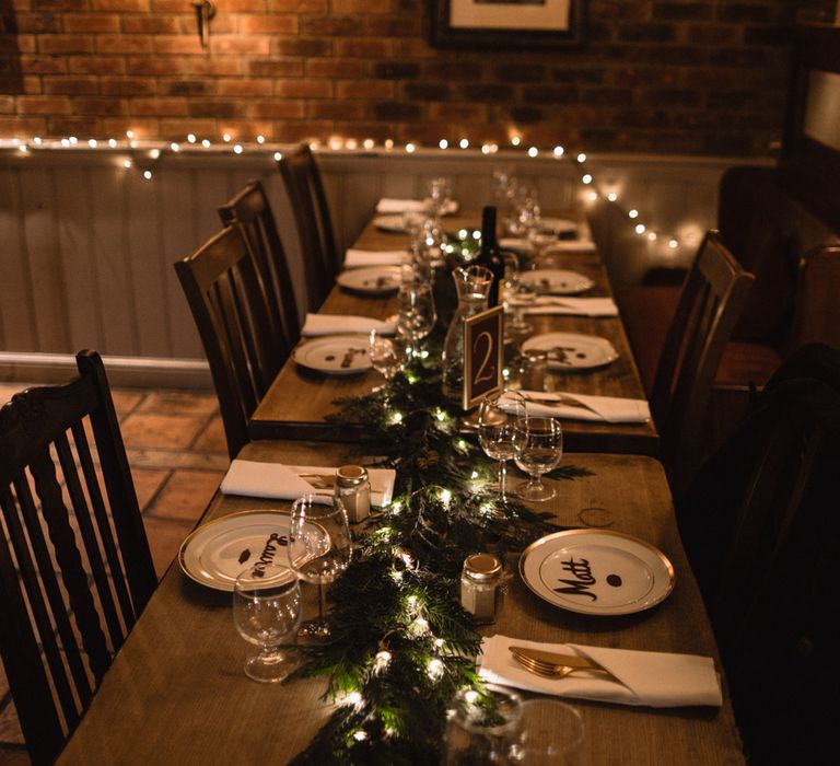 Christmas Pub Wedding At The Falcon Rotherwick With Bride In Alice By Watters And Candle Lit Wedding Ceremony Images By Rebecca Searle Photography