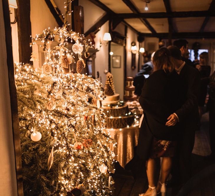 Christmas Pub Wedding At The Falcon Rotherwick With Bride In Alice By Watters And Candle Lit Wedding Ceremony Images By Rebecca Searle Photography