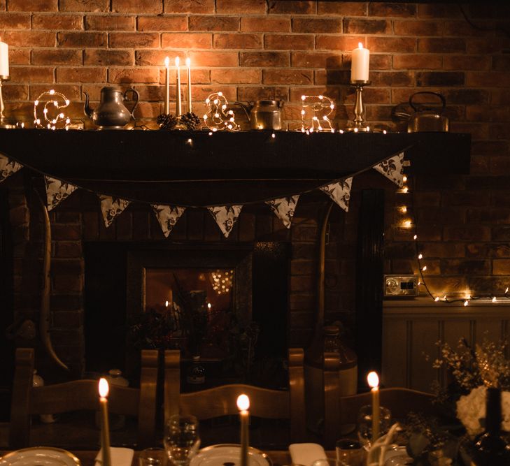 Christmas Pub Wedding At The Falcon Rotherwick With Bride In Alice By Watters And Candle Lit Wedding Ceremony Images By Rebecca Searle Photography