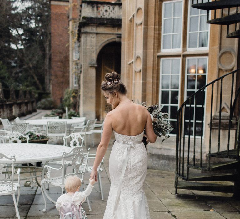 Bride In Alice By Watters With Daughter In Zara Baby // Christmas Pub Wedding At The Falcon Rotherwick With Bride In Alice By Watters And Candle Lit Wedding Ceremony Images By Rebecca Searle Photography