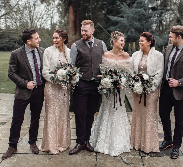 Winter Wedding Party Attire // Christmas Pub Wedding At The Falcon Rotherwick With Bride In Alice By Watters And Candle Lit Wedding Ceremony Images By Rebecca Searle Photography