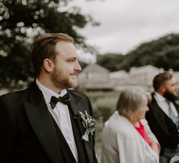 Groom Waiting For Bride During Ceremony