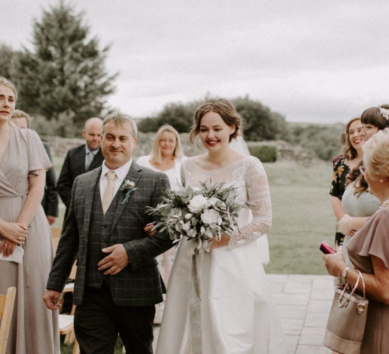 Bride Walking Down the Aisle by Father