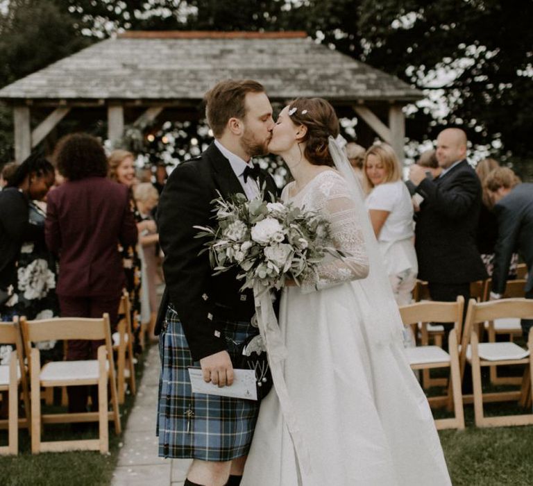 Bride and Groom Kiss Post Ceremony