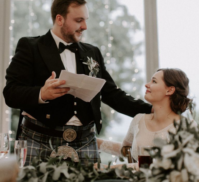 Bride Gazes at Groom During Speech