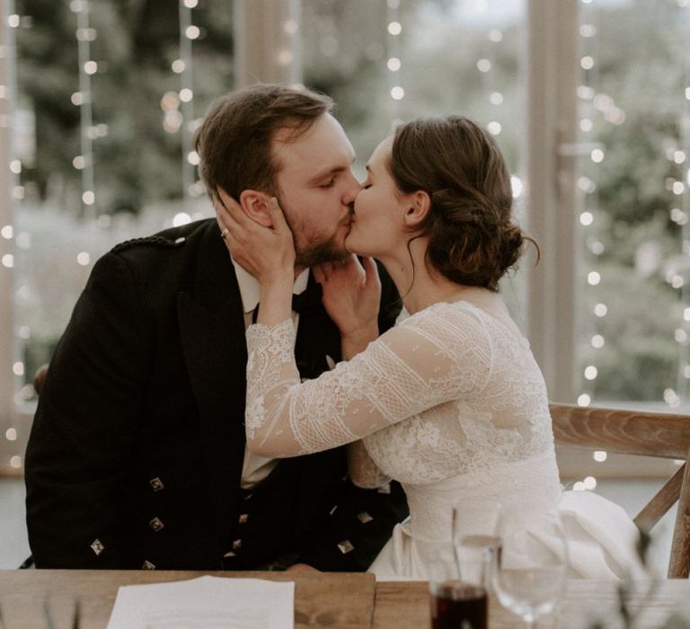 Bride and Groom Kiss After Speech