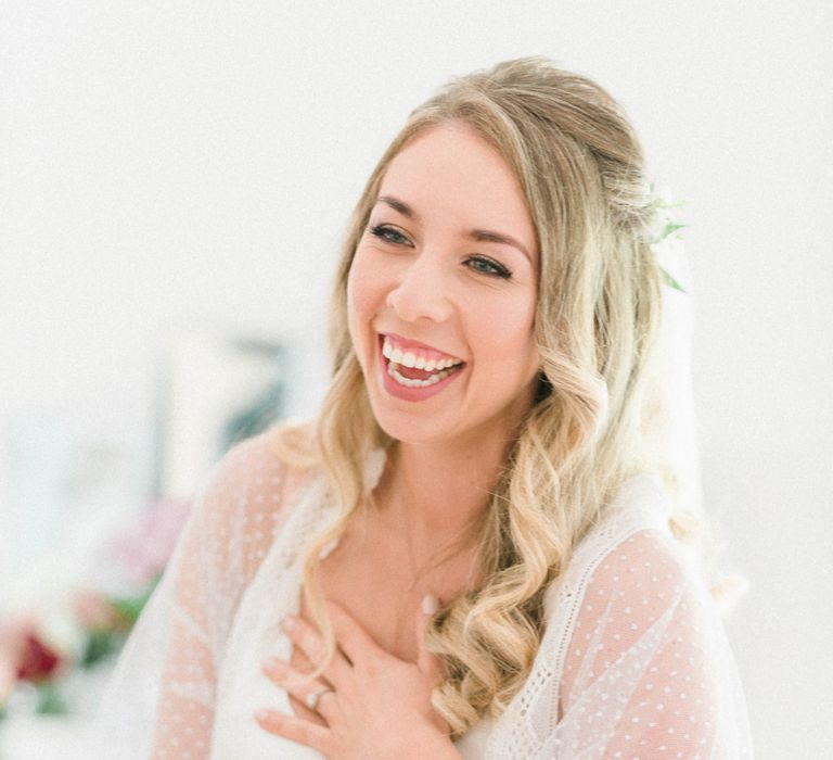 Bride in White Lace Getting Ready Robe | Half Up Half Down Bridal Hair Do | Country Tipi Wedding with Macramé Arch and Hanging Flowers | Sarah-Jane Ethan Photography