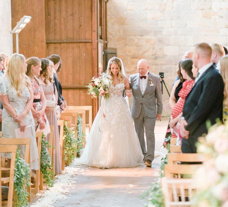 Arrival of the Bride | Bride in Strapless Liz Martinez Ballgown Wedding Dress with Embroidered Flowers | Cathedral Length Veil in Blush Soft Tulle | Oversized Bridal Bouquet of White Peonies, Blush Astlibe, Trailing Greenery and Burgundy Eucalyptus | Father of the Bride in Grey Suit with Burgundy Braces, Bow Tie and Brogues | Country Tipi Wedding with Macramé Arch and Hanging Flowers | Sarah-Jane Ethan Photography