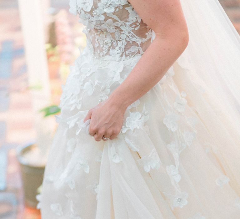 Strapless Liz Martinez Ballgown Wedding Dress with Embroidered Flowers | Country Tipi Wedding with Macramé Arch and Hanging Flowers | Sarah-Jane Ethan Photography