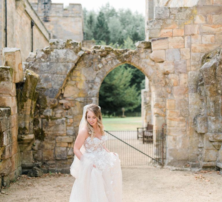 Bride in Strapless Liz Martinez Ballgown Wedding Dress with Embroidered Flowers | Cathedral Length Veil in Blush Soft Tulle | Country Tipi Wedding with Macramé Arch and Hanging Flowers | Sarah-Jane Ethan Photography