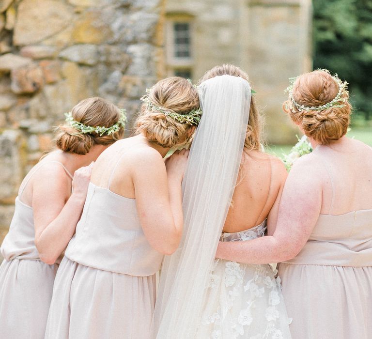 Bride in Strapless Liz Martinez Ballgown Wedding Dress with Embroidered Flowers | Cathedral Length Veil in Blush Soft Tulle | Bridesmaids in Blush Pink Rita Roushdy Dresses | Flower Crowns | Country Tipi Wedding with Macramé Arch and Hanging Flowers | Sarah-Jane Ethan Photography