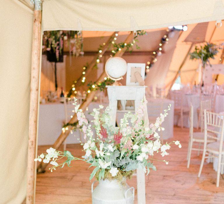 Tipi Decor | Large Urn Filled with Flowers | Country Tipi Wedding with Macramé Arch and Hanging Flowers | Sarah-Jane Ethan Photography