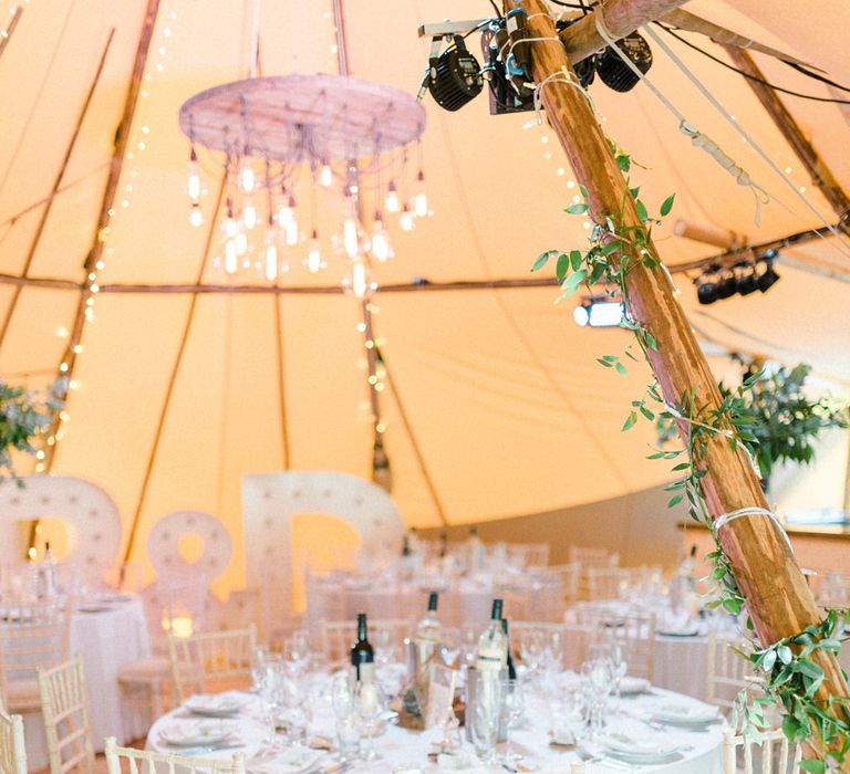 Tipi Decor | Large Letter Lights | Country Tipi Wedding with Macramé Arch and Hanging Flowers | Sarah-Jane Ethan Photography